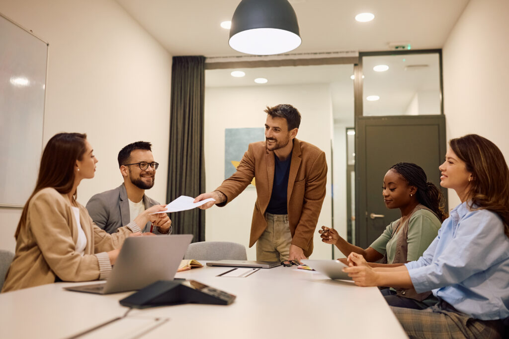 business team meeting to discuss documents for What to Expect From M&A Due Diligence: A Small Business Guide for Buyers and Sellers in Atlanta